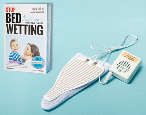 Male Bed Wetting Alarm With Moisture-Sensitive Sensor Pad
